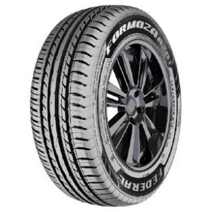 A tire with black rims on top of a white background.